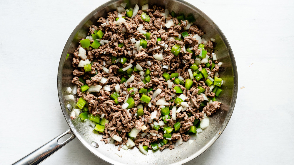 cooking beef and veggies for American goulash