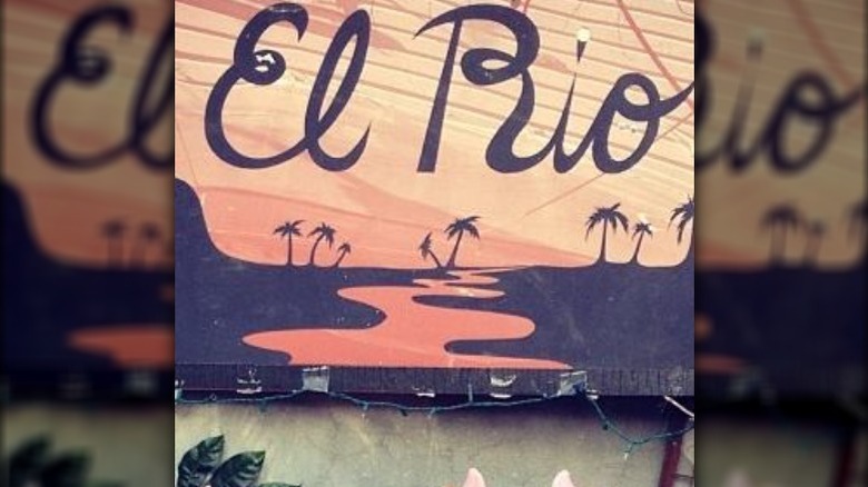 El Rio outdoor sign with strings of lights 