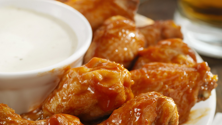 Close up of chicken wings with ranch 