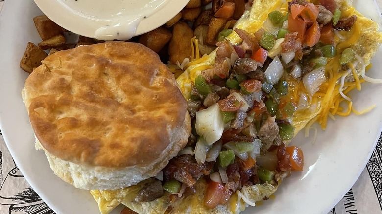 Plate of biscuit and omelette