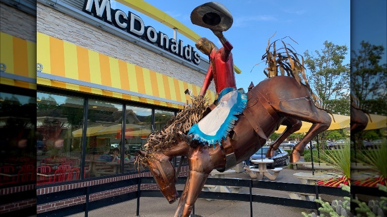 cowboy on horse statue at mcdonald's