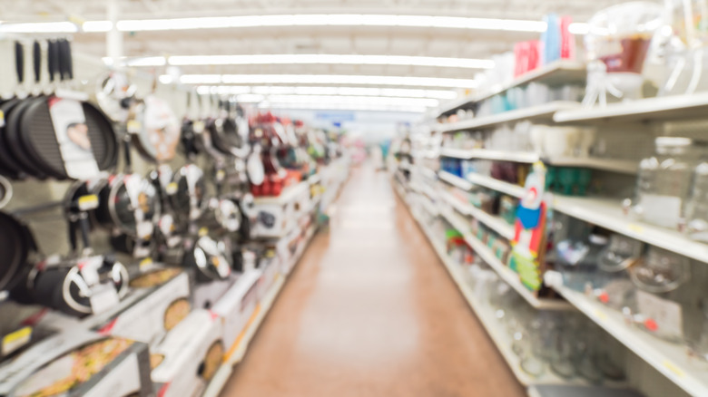 Store aisle filled with pots and pans 