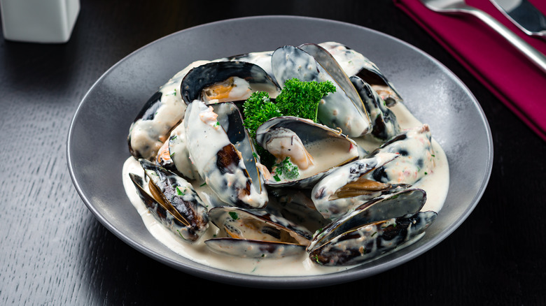 Cooked mussels in a creamy sauce