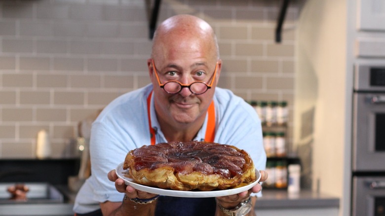 Andrew Zimmern with tarte tatin dessert