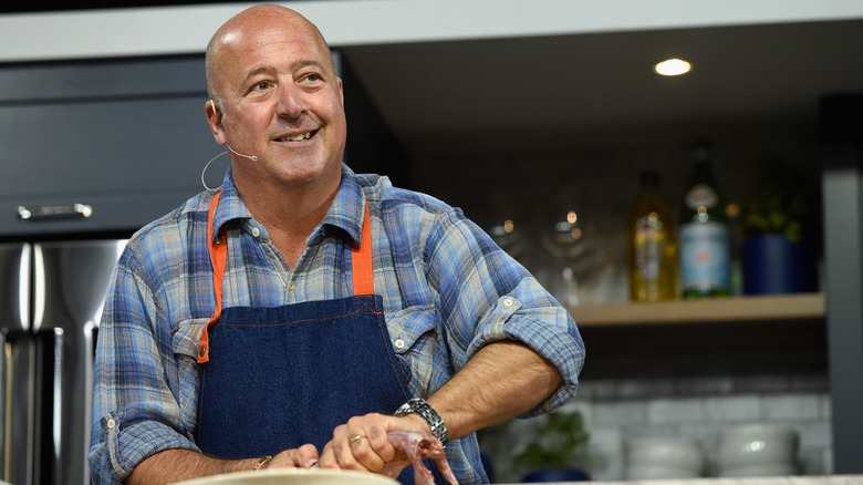 Andrew Zimmern cooking