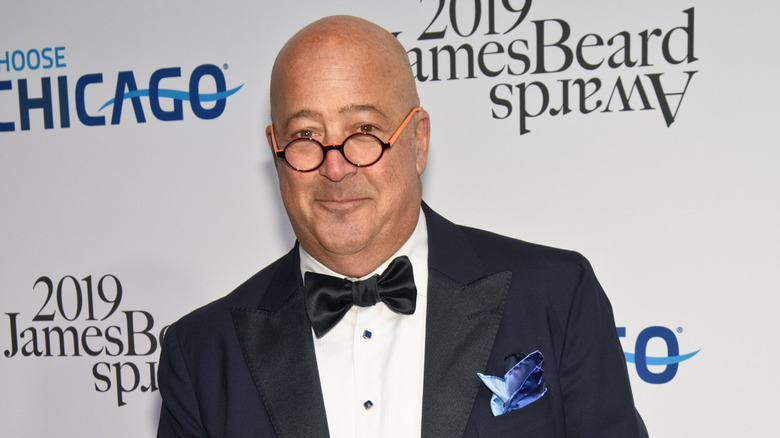 Andrew Zimmern in a suit