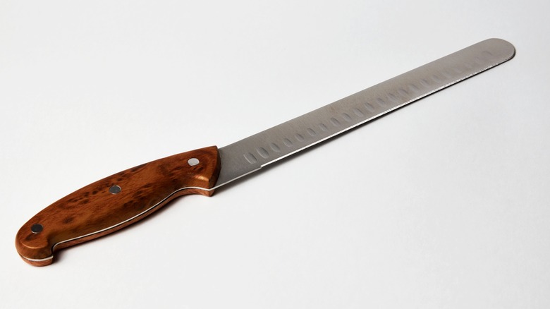 A slicer knife on a white background