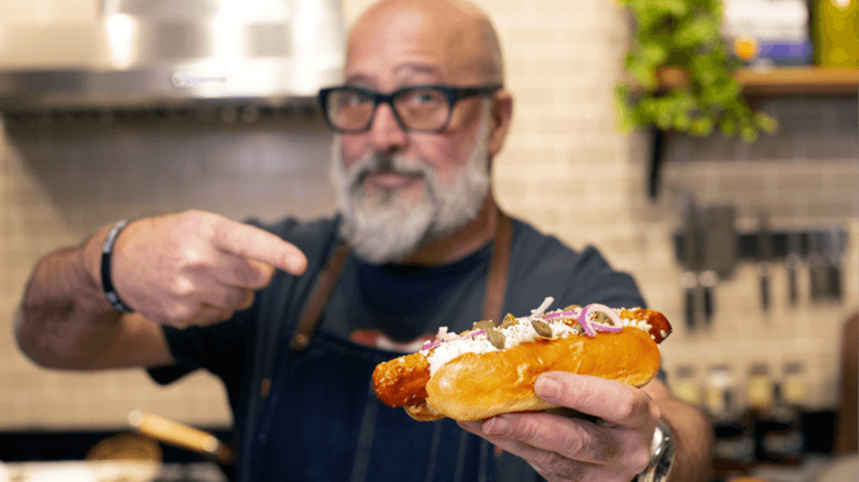 Andrew Zimmern with hot dog