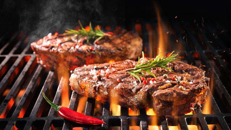 steaks on grill