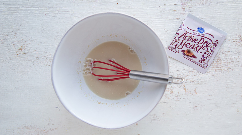 yeast and water in bowl 