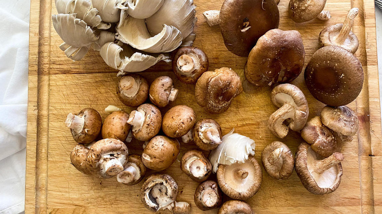 Mushrooms on cutting board