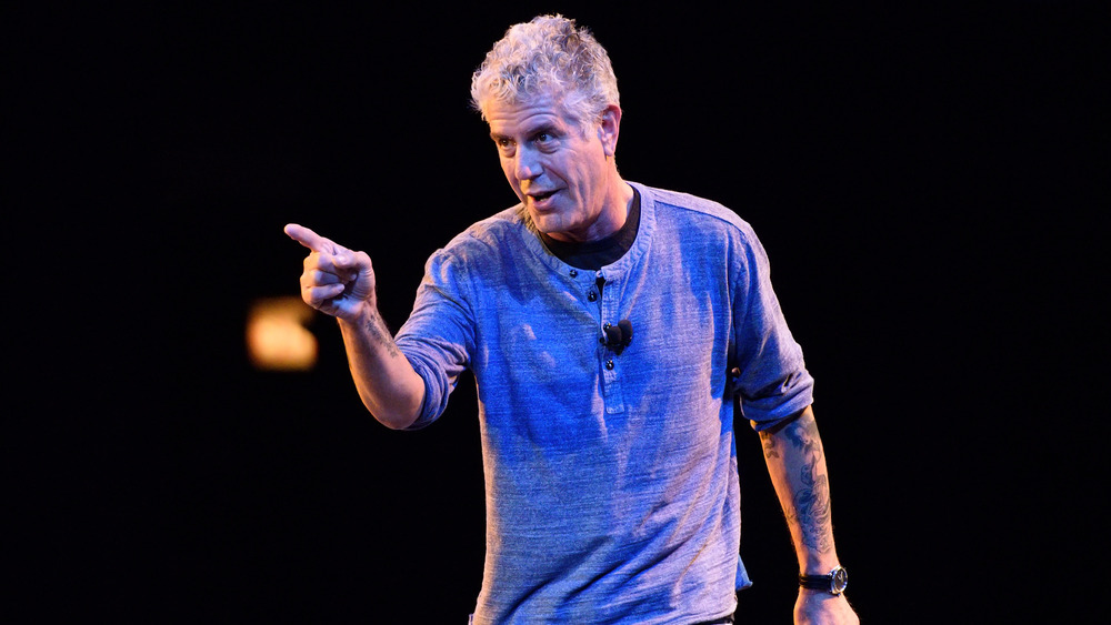 Anthony Bourdain pointing