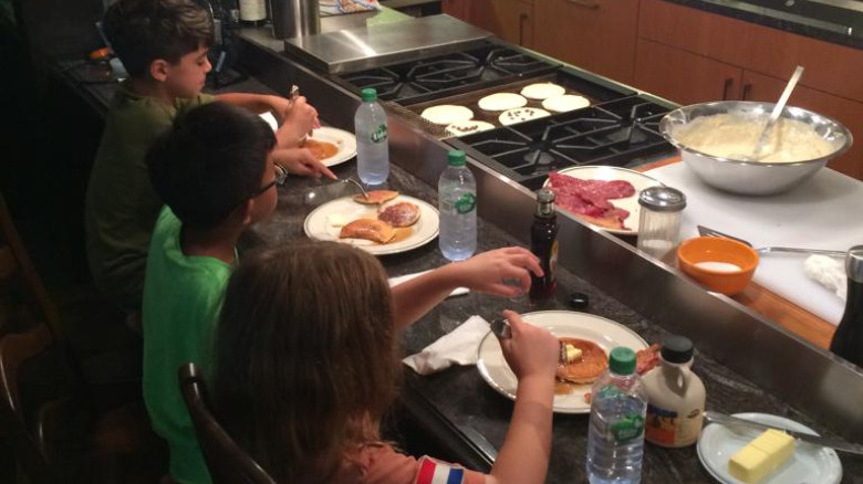 Kids eating pancakes