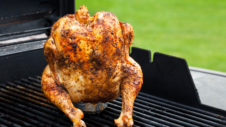 A beer can chicken on the grill