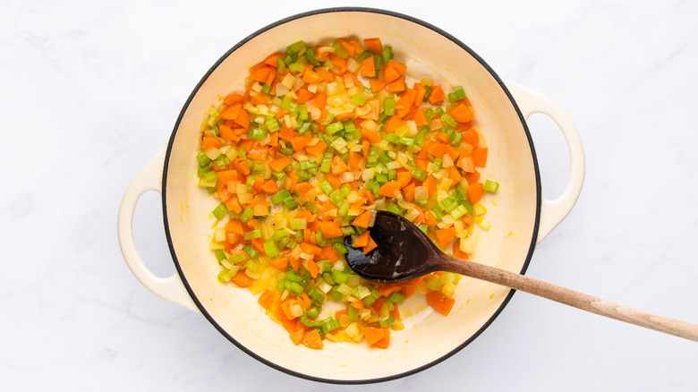 Diced carrot, celery, and onion in soup pot