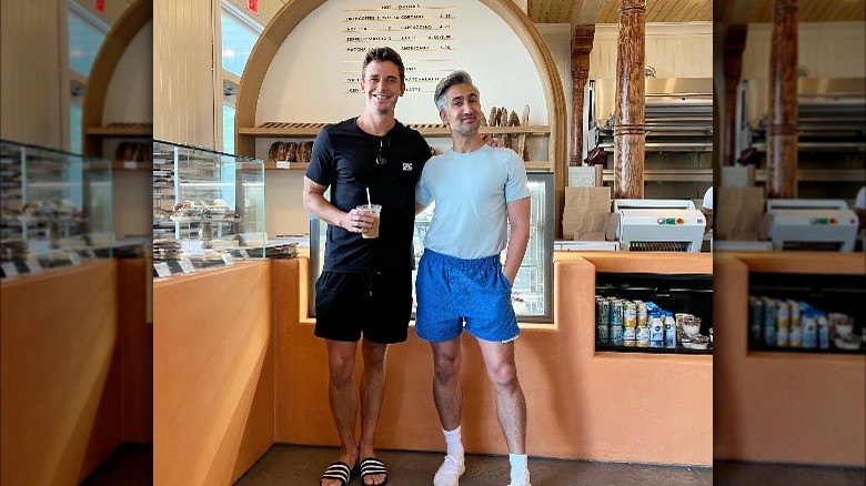 antoni porowski and tan france embracing