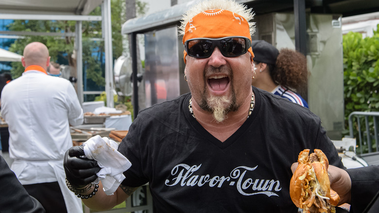 Guy Fieri rocking on as he does