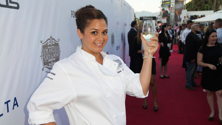 Antonia Lofaso raising a glass