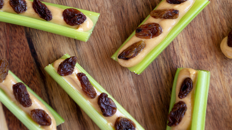 peanut-butter stuffed celery with raisins