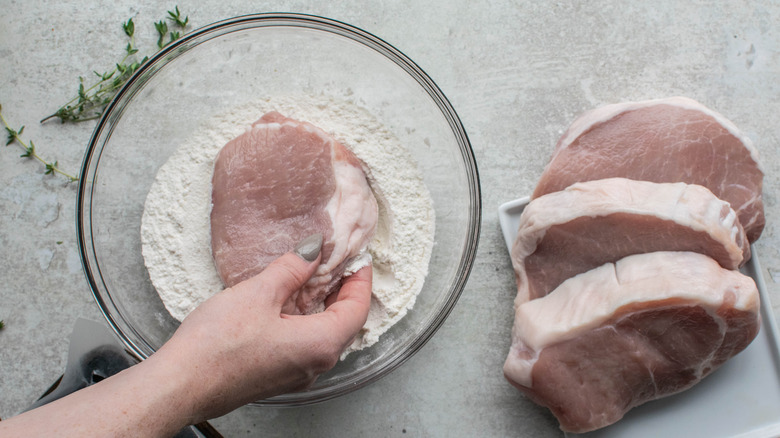 breading pork chops in flour