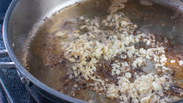 sautéing minced garlic and shallots