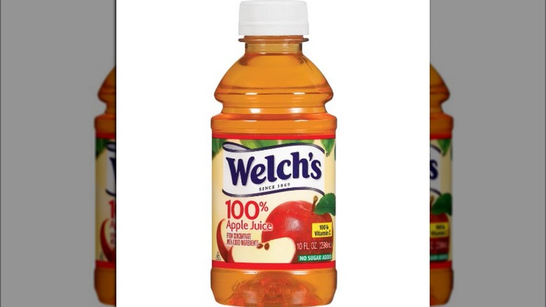 A bottle of Welch's apple juice