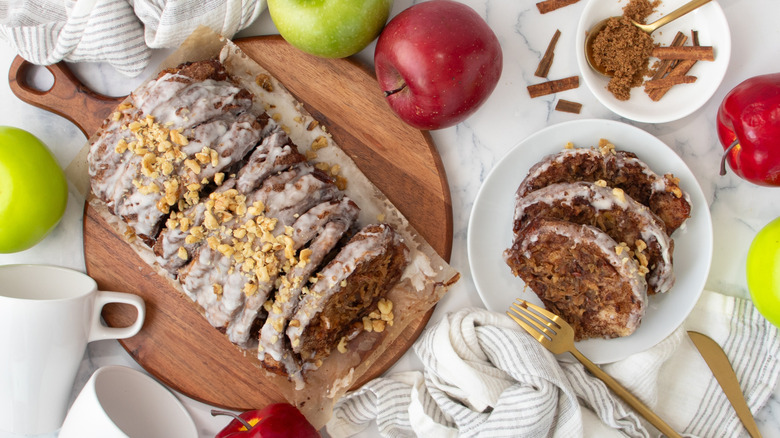 Pull-apart apple pie loaf with icing and walnuts