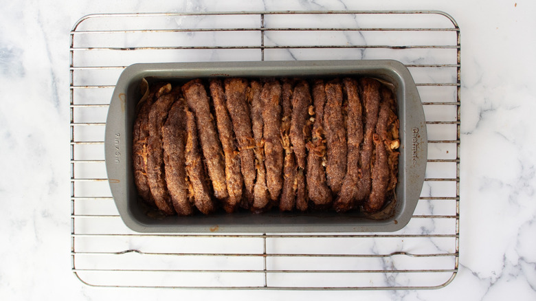 Baked apple pull-apart loaf on cooling rack