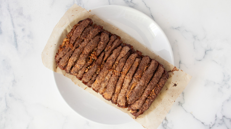 Pull-apart apple pie loaf on plate