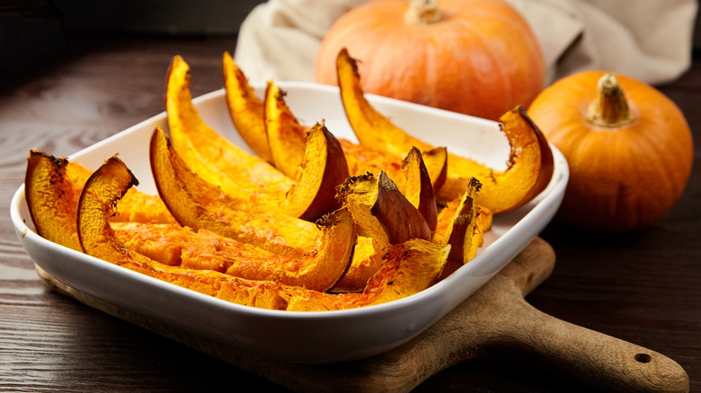 Baked pumpkin in ceramic bowl