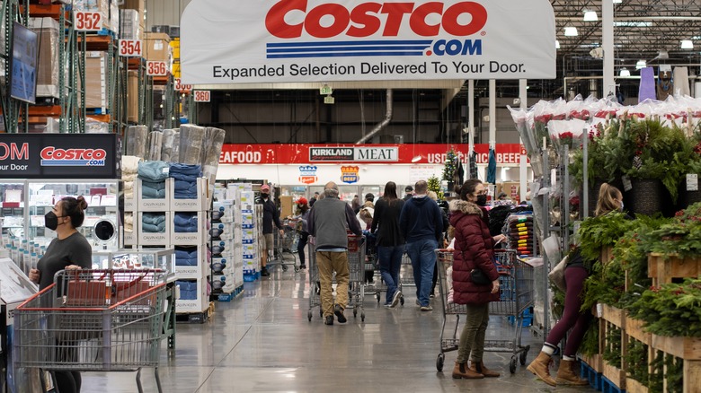 Costco shoppes buying Christmas trees