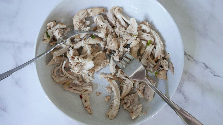 shredded chicken in bowl 