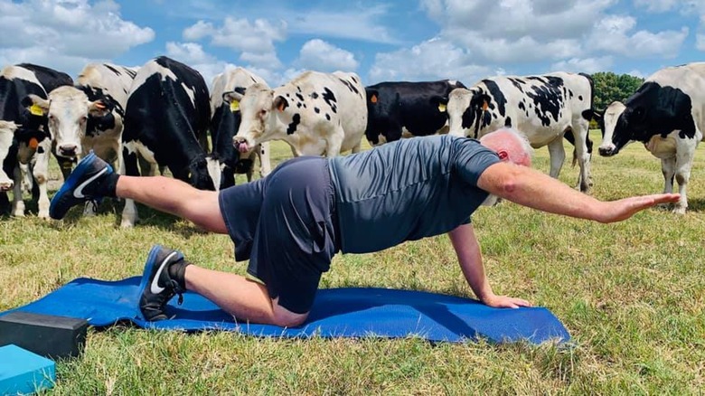 Art Smith doing exercise in cow field during quarantine