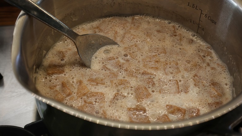 saucepan of cereal and milk