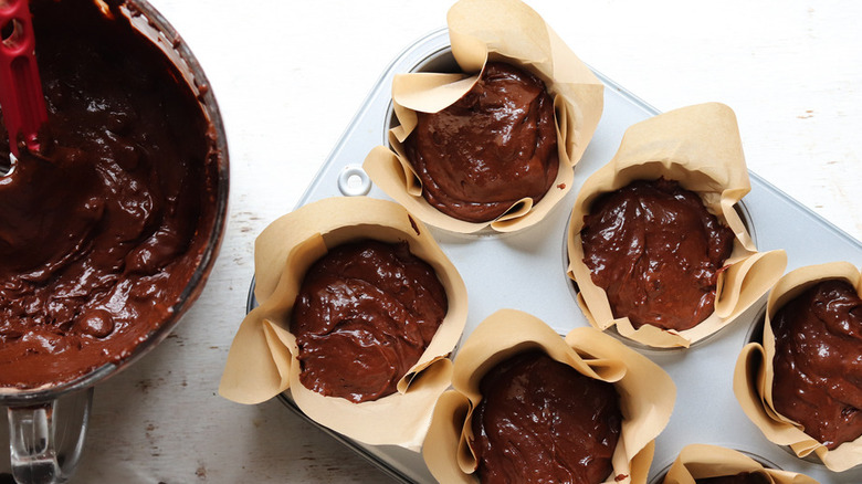 chocolate batter in muffin pan