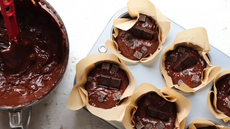 chocolate batter in muffin pan