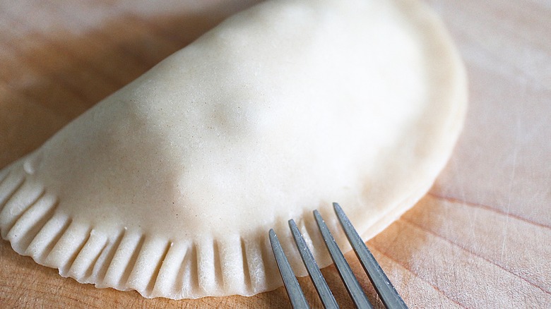 crimping edges of closed empanada