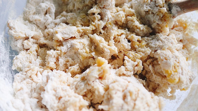 mixing up empanada dough