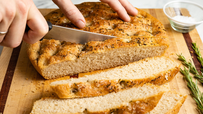 focaccia being sliced