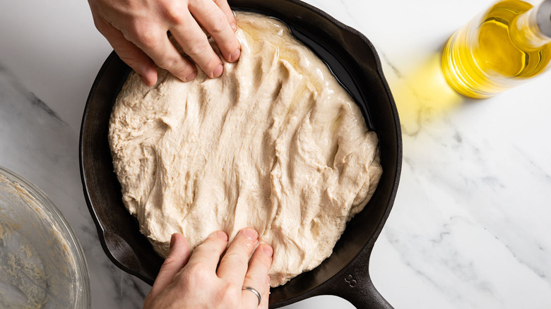 spread dough in pan