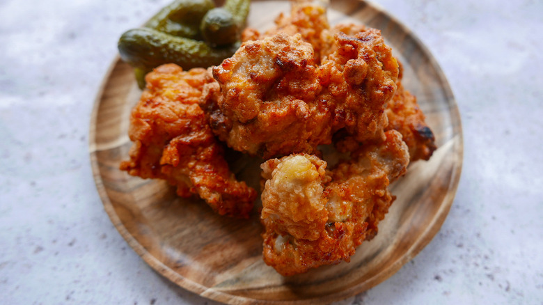 Authentic Nashville Hot Chicken Recipe chicken on plate 