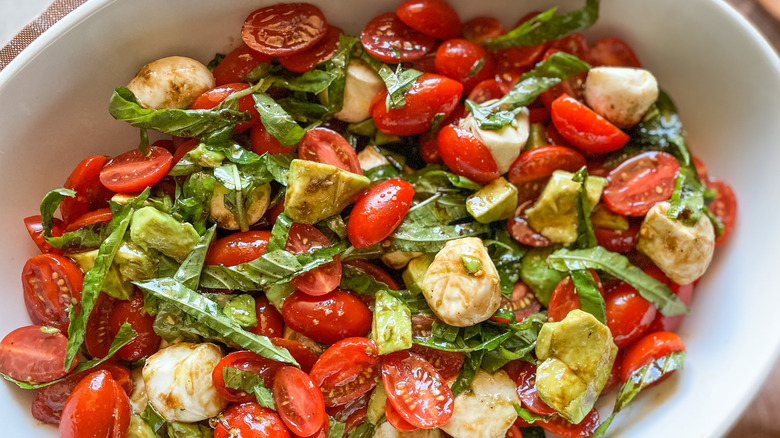 avocado caprese salad in bowl