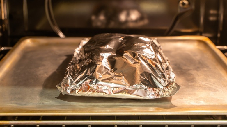 https://www.mashed.com/img/gallery/avoid-this-aluminum-foil-mistake-to-keep-your-convection-oven-in-tip-top-shape/intro-1703690743.jpg