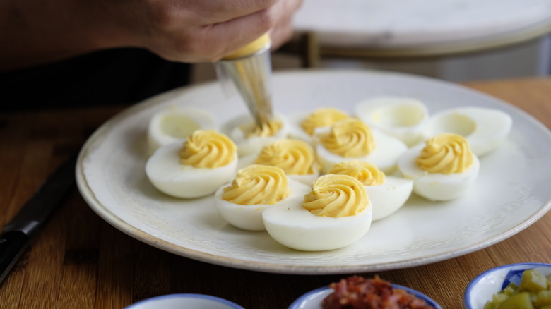 Egg mixture being added to egg whites