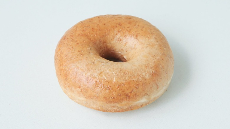 Wheat bagel on white background