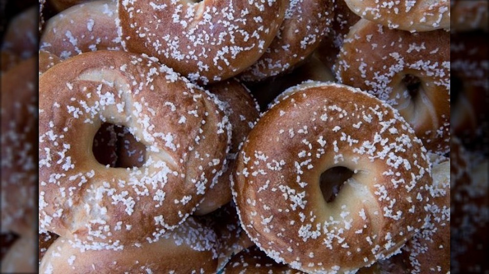 Salt bagels piled together