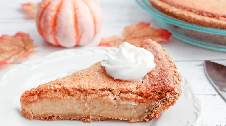 pumpkin pie slice with cream