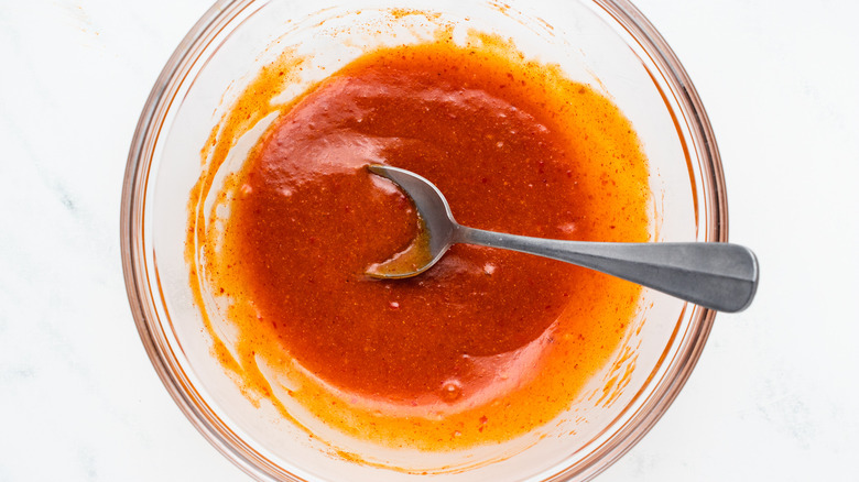 Buffalo marinade in mixing bowl