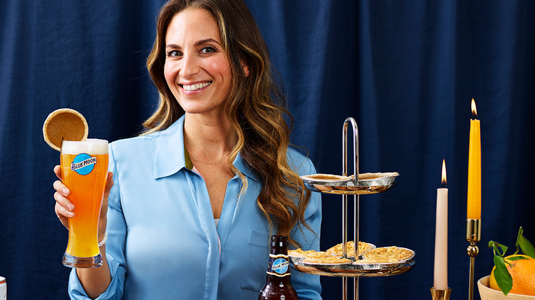 Melissa Ben-Ishay holding beer with pie garnish