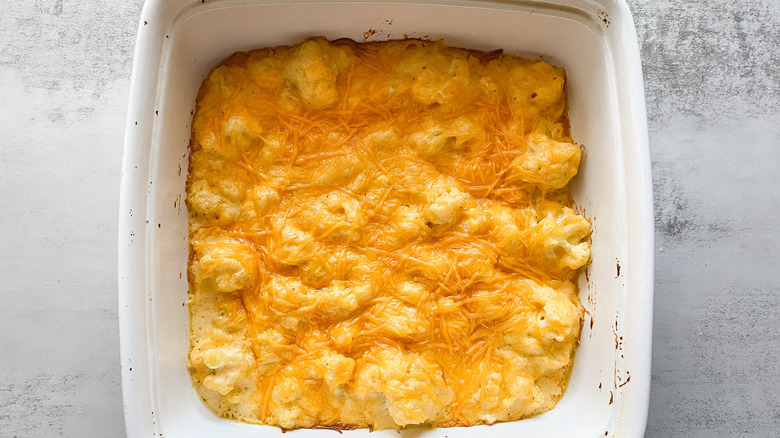 cheesy baked cauliflower in dish